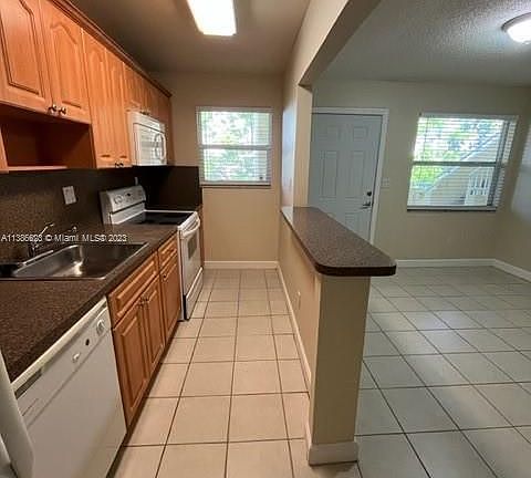 5th image of 5839 SW 74th Ter APT 203
