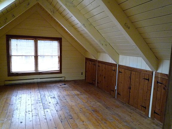 One of Two Bedrooms in Log Home