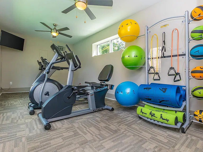 Stay fit and energized in this well-equipped apartment gym.