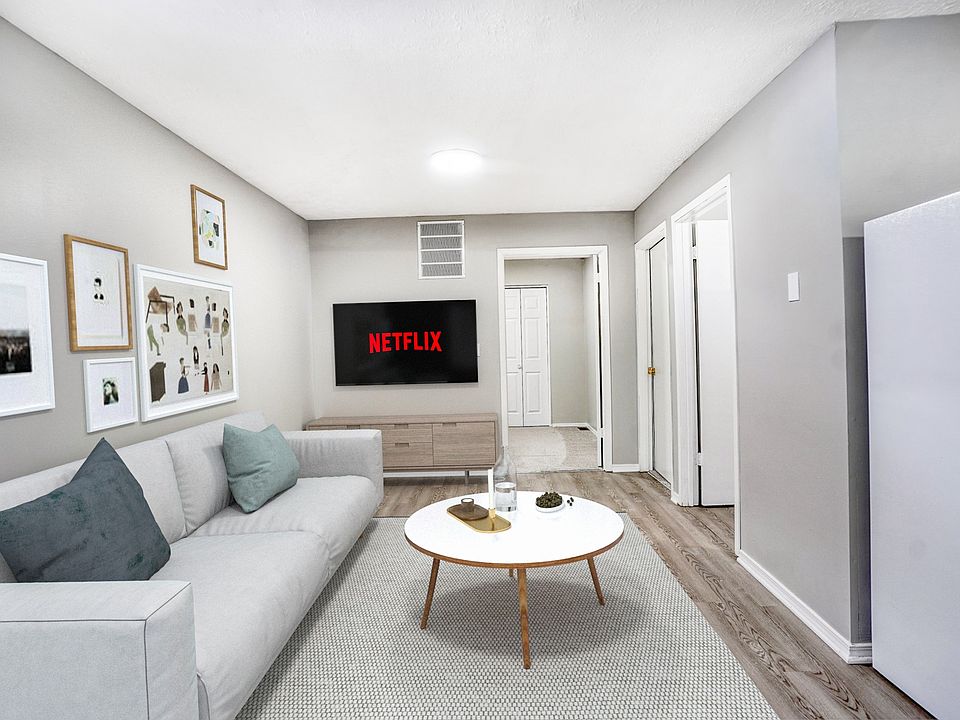 Elevate your living experience at Four Eight Group, where modern aesthetics meet comfort. This stylish living space features a cozy atmosphere, ideal for relaxation and entertainment. Schedule your tour today and find your perfect home!