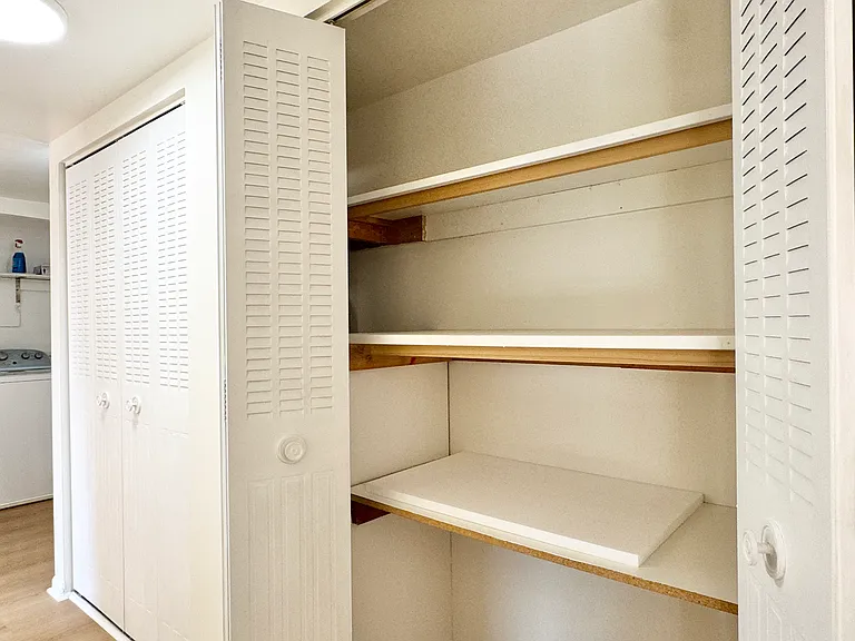 Two double-door hallway closets