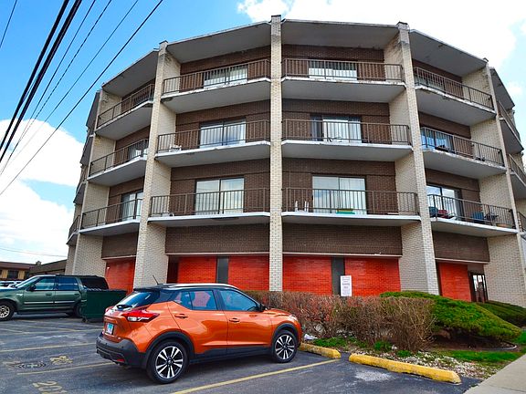 View of unit ~ (2nd level of patios is 3rd floor of building)this shows unit 301's 3 balconies and t