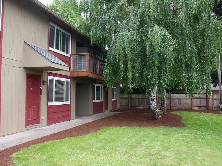 Common yard area professionally landscaped.