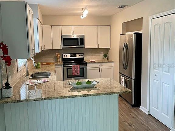 5th image of 711 Ponderosa Dr W