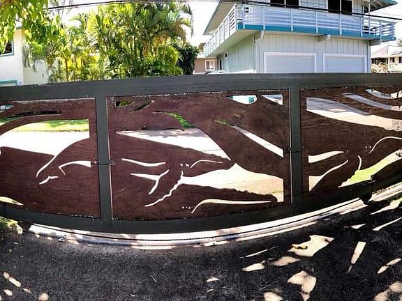 State-of-the-art commercial grade remote controlled via phone or manual keypad solar gate, custom-designed, one-of-a-kind whale scene created by local artist.