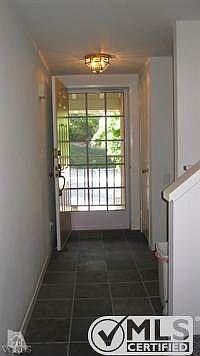Walk in to the nicely updated foyer with slate flooring in the entry, bathroom and the kitchen.