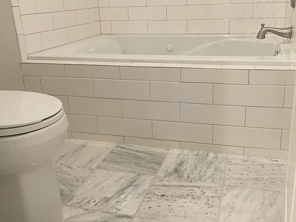 Master bath with marble