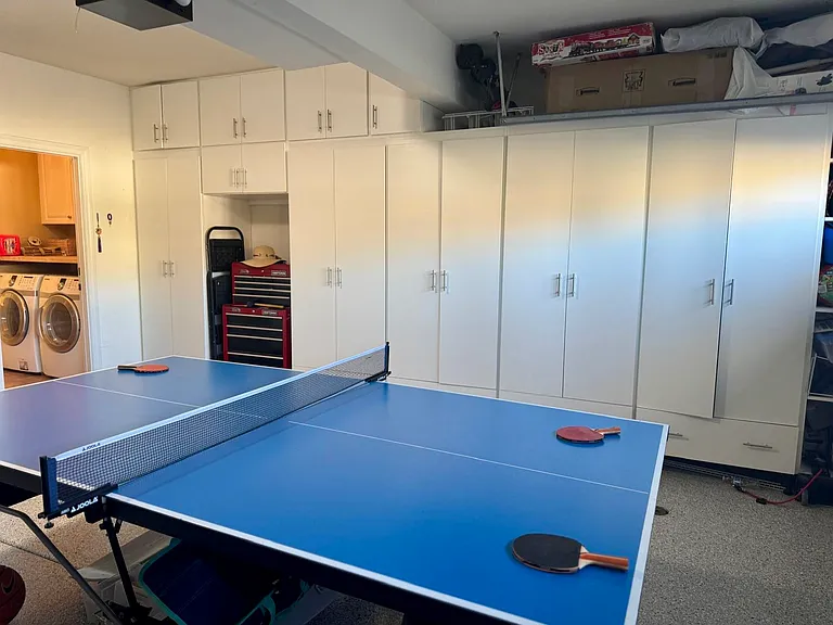 Large garage with wall-to-wall storage