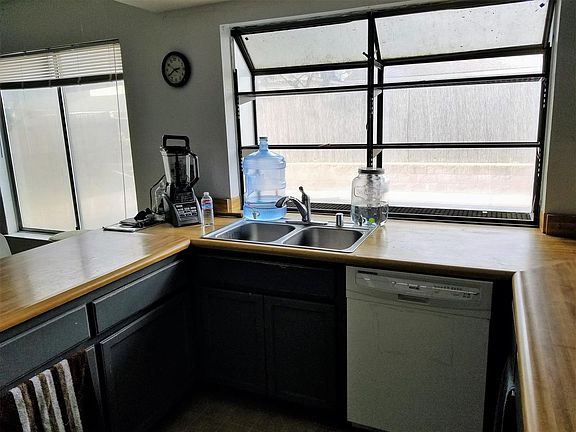 Kitchen Garden window.  Newer sink and faucet
