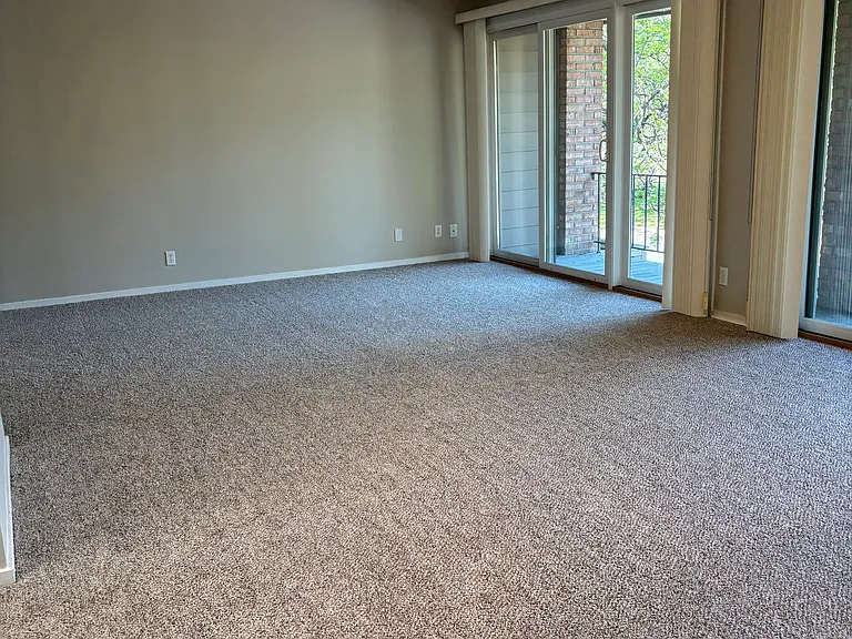 Two patio doors to the private balcony