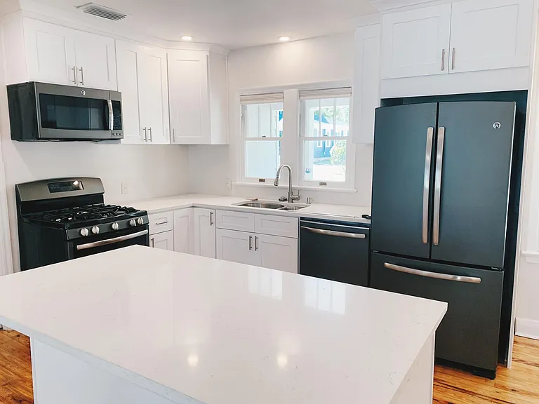 Newly updated kitchen with quartz countertops