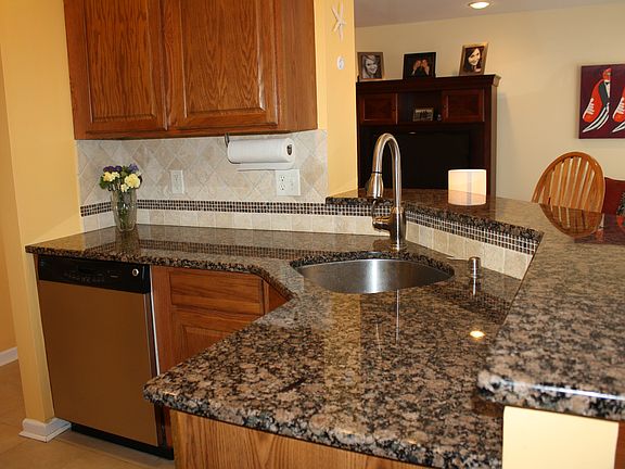 Kitchen w granite countertop