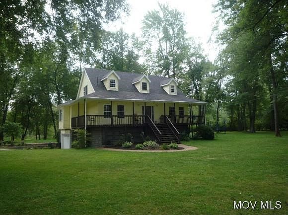 Situated on 5 Parklike acres