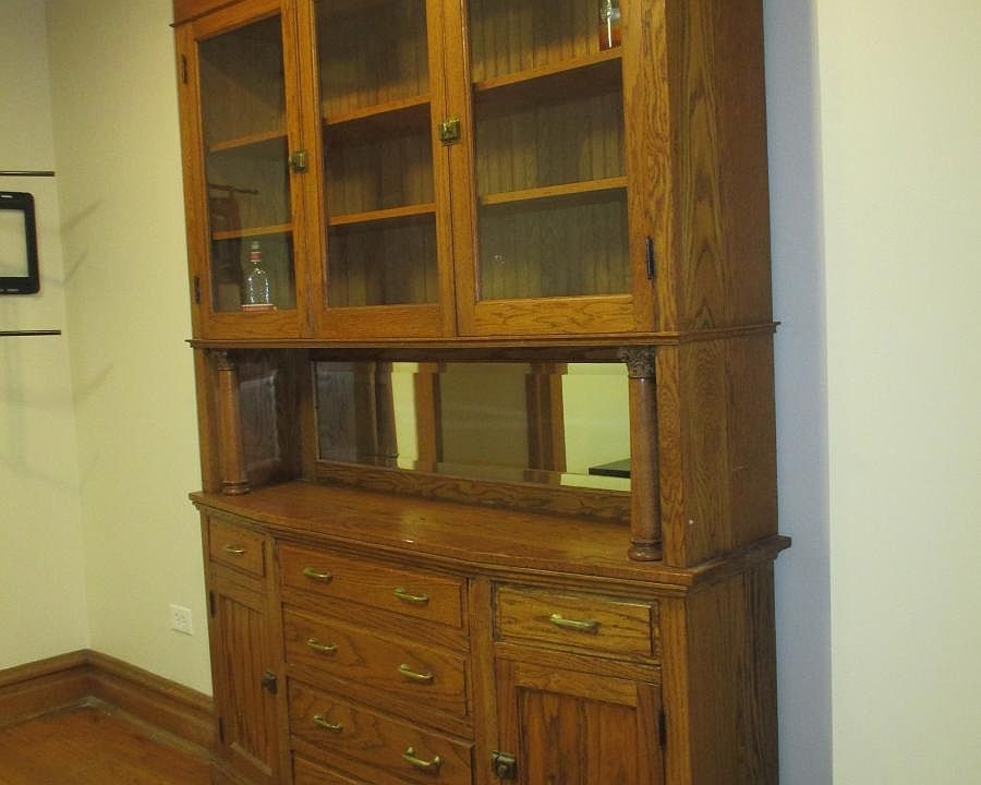 Antique hutch in formal dining room (or) living room