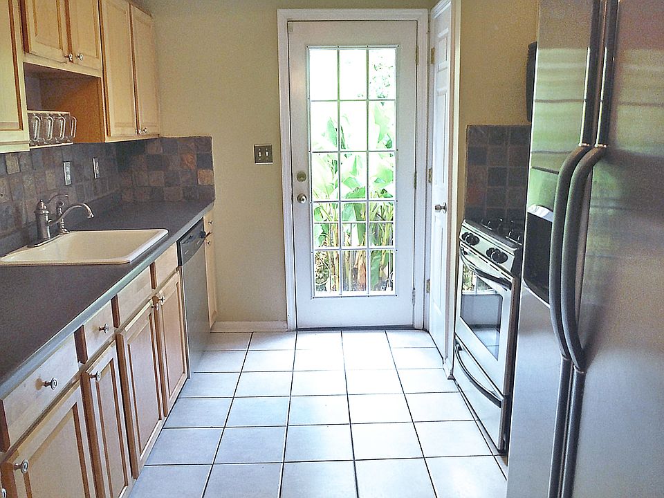 Kitchen looks out to back courtyard