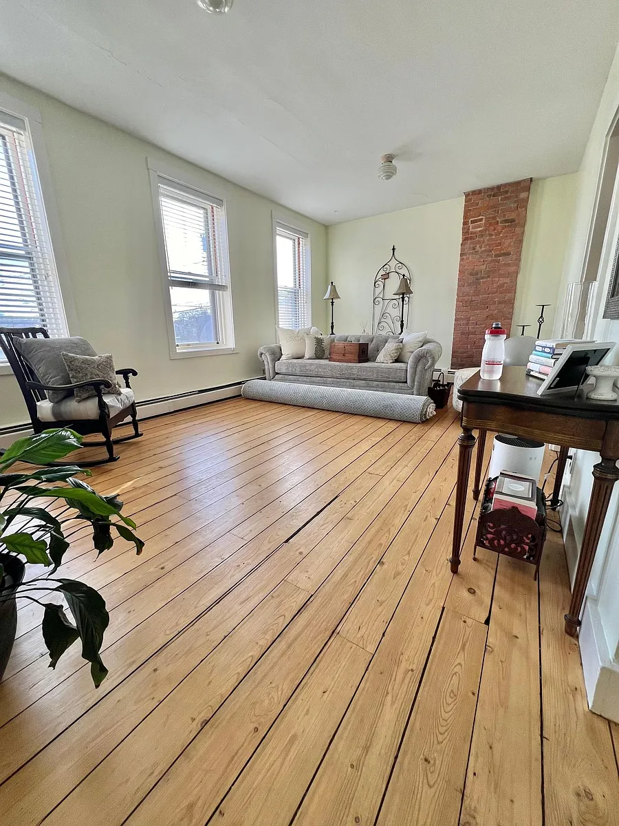 Living room. South facing over Wickford Village. - 9 W Main St #6