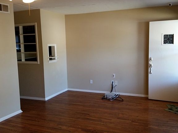 View 1 of livingroom
						:
						THE BOX AND WIRES ARE FOR THE SECURITY CAMERA SYSTEM