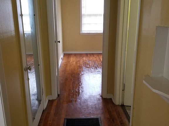 Hallway between bedrooms and bathroom
