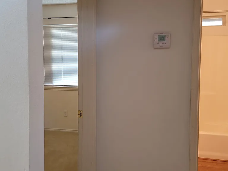 Foyer looking into bathroom/ bedroom 1