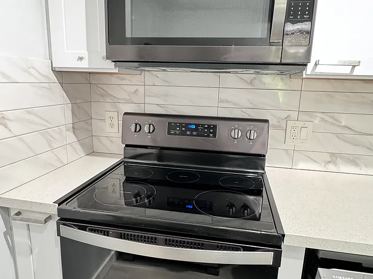 Recently remodeled kitchen, with new stainless steel, Whirlpool and Samsung appliances