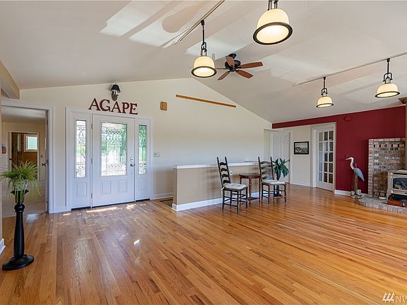 Showing, our dining room is right off the kitchen. Easy entertaining.  Views of Rainbow Bridge & marina, 