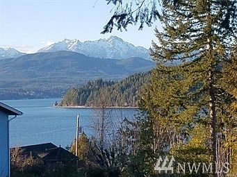 View from lot looking up the Great Bend in Hood Canal towards Hoodsport.  Olympic Mtns in distance. 