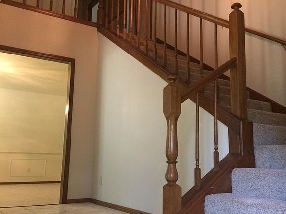 Entry, dining room to left