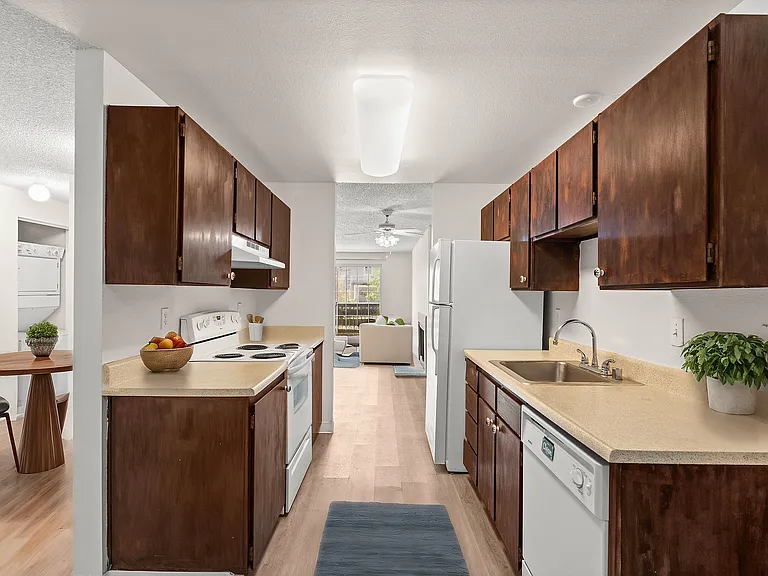 Experience the blend of style and comfort in this inviting kitchen and living area. Experience the blend of style and comfort in this inviting kitchen and living area.