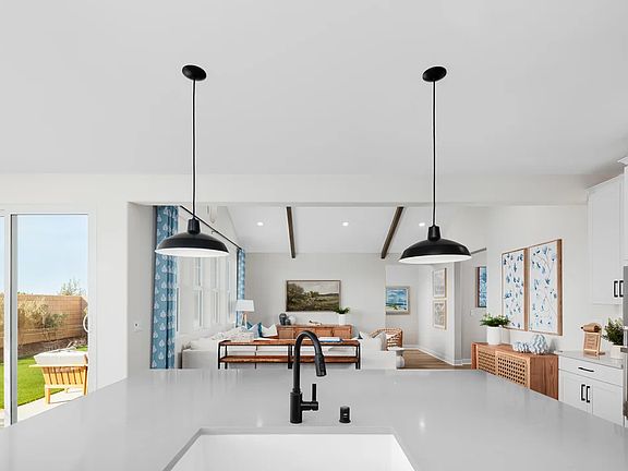 Kitchen with pendant lighting and spacious island