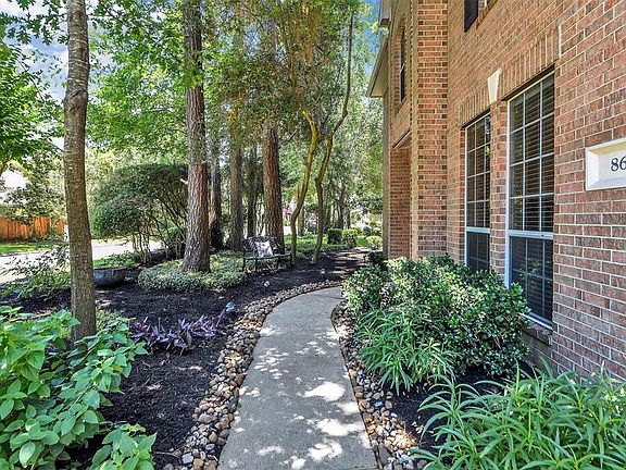 The shaded garden pathway to the front entry.