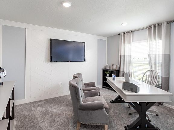 Den area for office or multipurpose room - New home for sale in Lake Alfred, FL. Photo showcases the