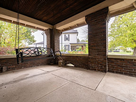 Neighboring porch that is the same as the porch on the home that is for rent.