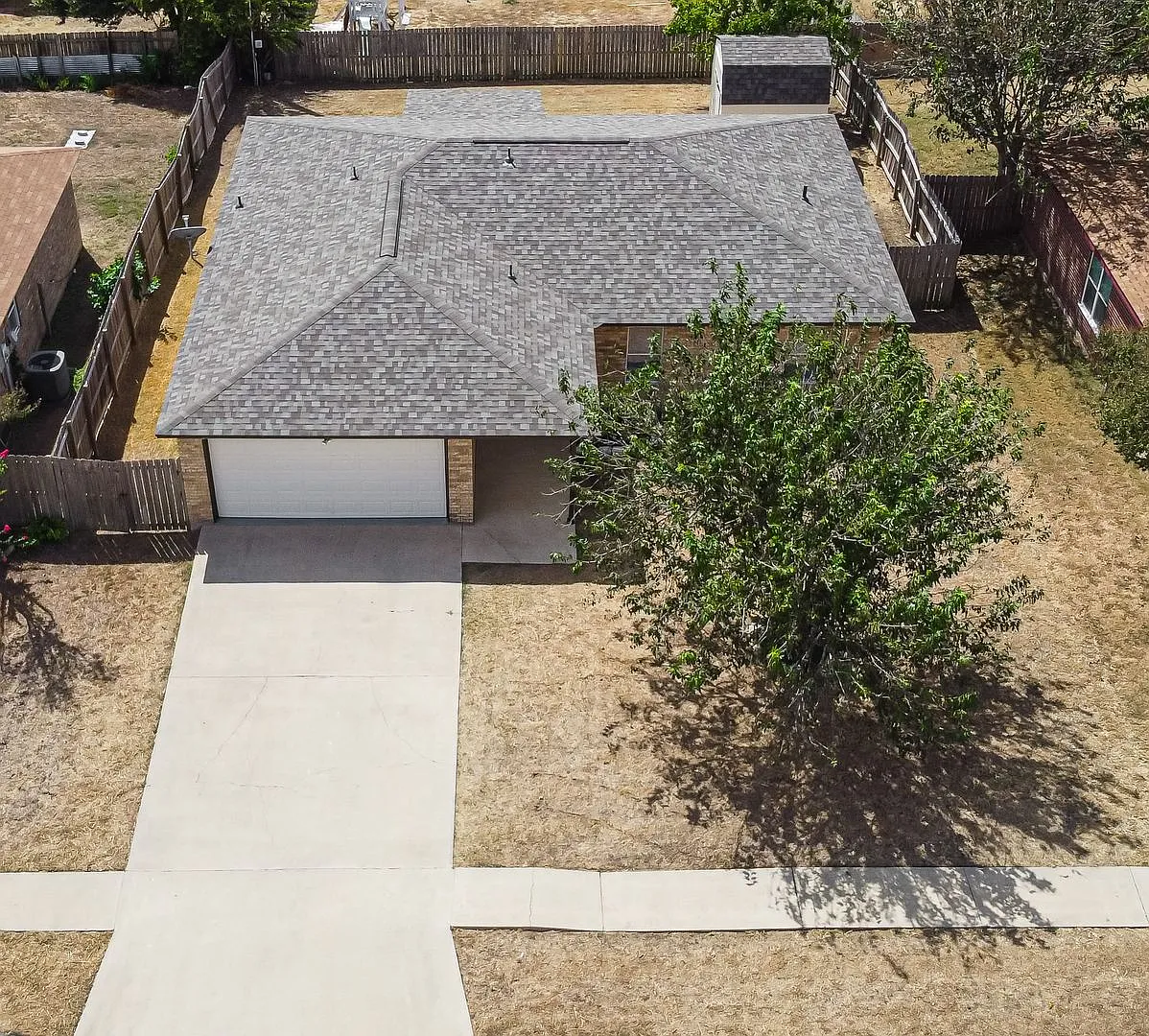 4-Bedroom Home with 2-Car Garage & Fenced Backyard! — Photo 2