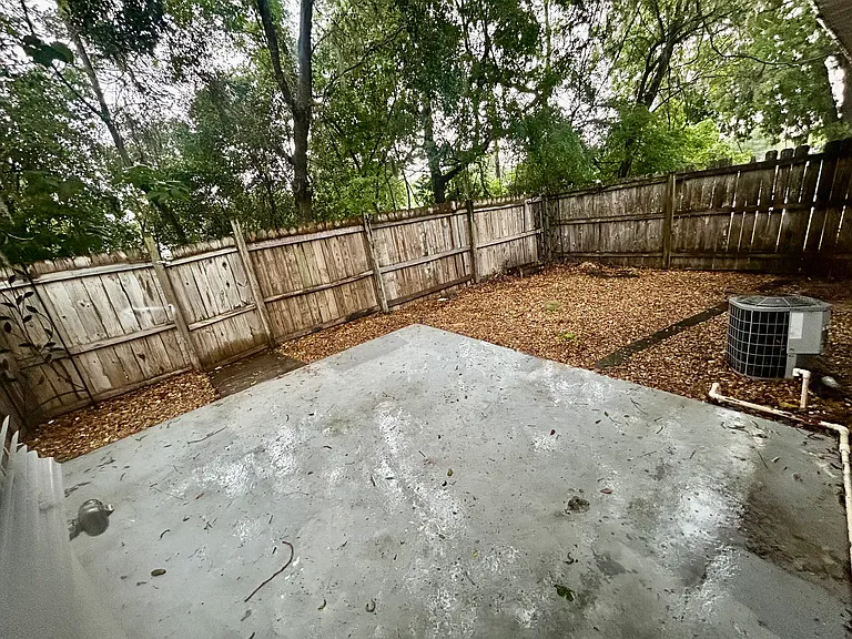 Picture of the fenced in back yard