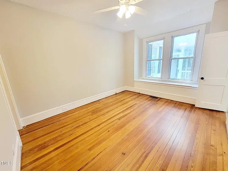Formal Dining Room with pantry and bay windows