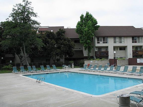 POOL AND HOT TUB AREA, ALSO HAS TENNIS COURTS