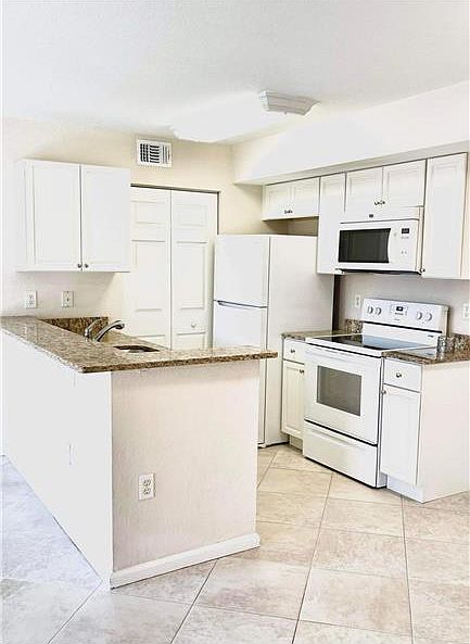 1st image of 151 SW Palm Dr APT 203