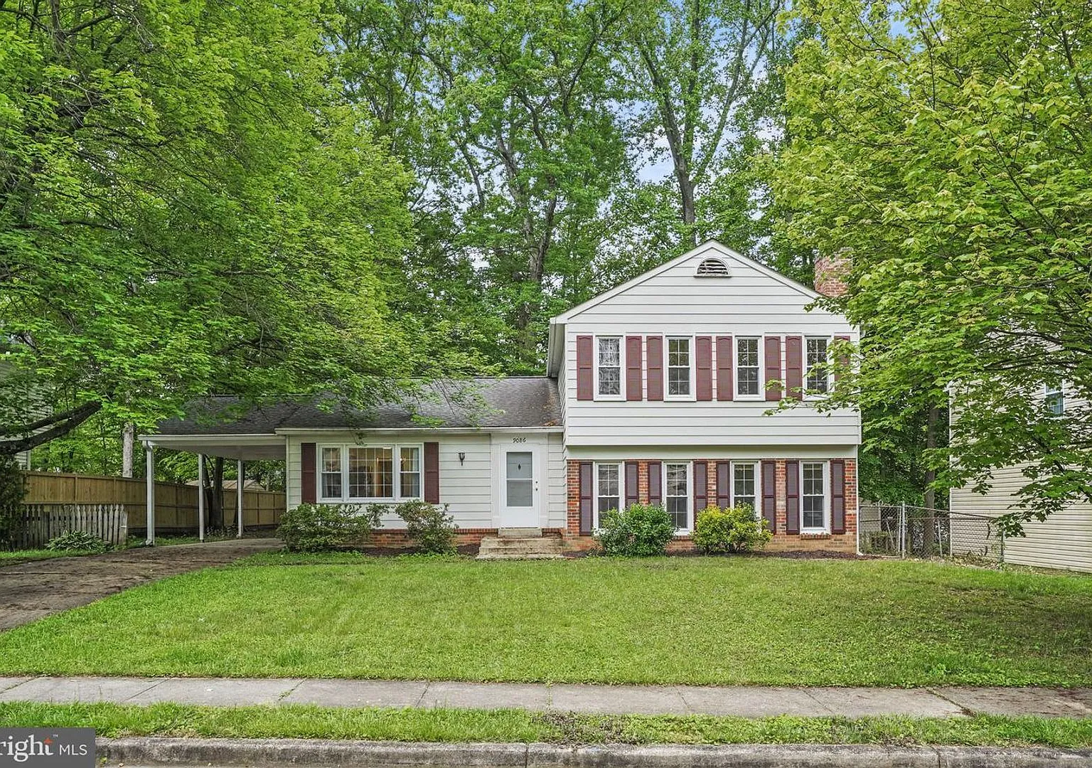 This stunning split-level home boasts 4 bedrooms, 3 baths, and over 1900 sq feet of living space ... — Photo 2