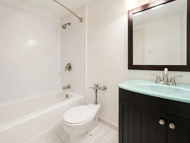 Very nice updated bathroom with furniture vanity