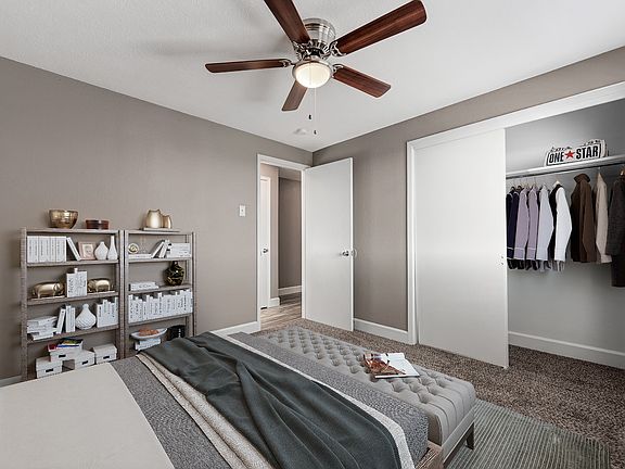 Large one bedroom with a ceiling fan and closet