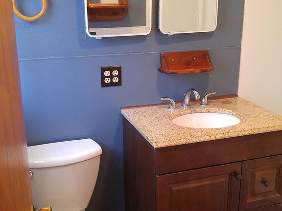 one bathroom with bath and shower