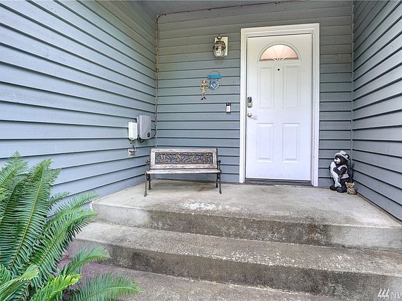 Greet your guests under the covered front porch. 