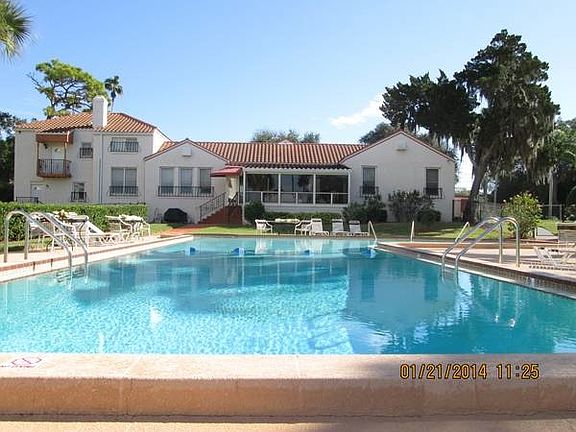 Community swimming pool and clubhouse.