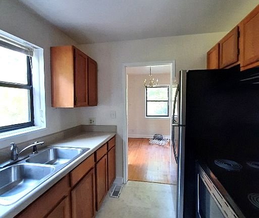 Dishwasher, Range, Refrigerator. W/D in closet.