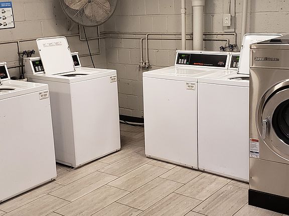 Part of laundry room and entrance to extra storage.
