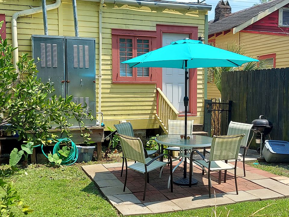 The shared fenced-in backyard
