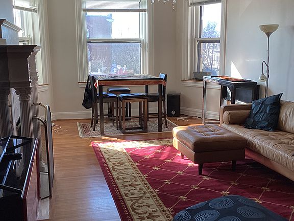 Living room with bay window and lots of natural light