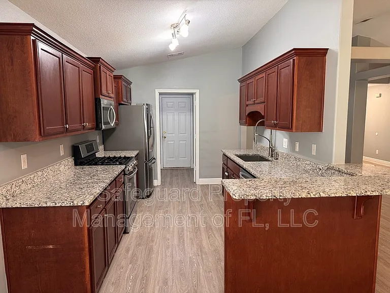 9615 Laramie Dr — Photo 3