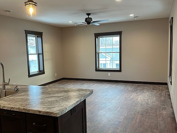 Bright and sunny open format for kitchen/dining/living room