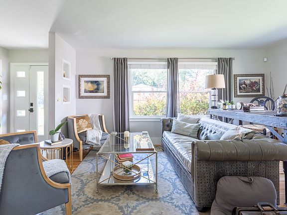 Living Room / Front Door. South facing windows - lots of light!